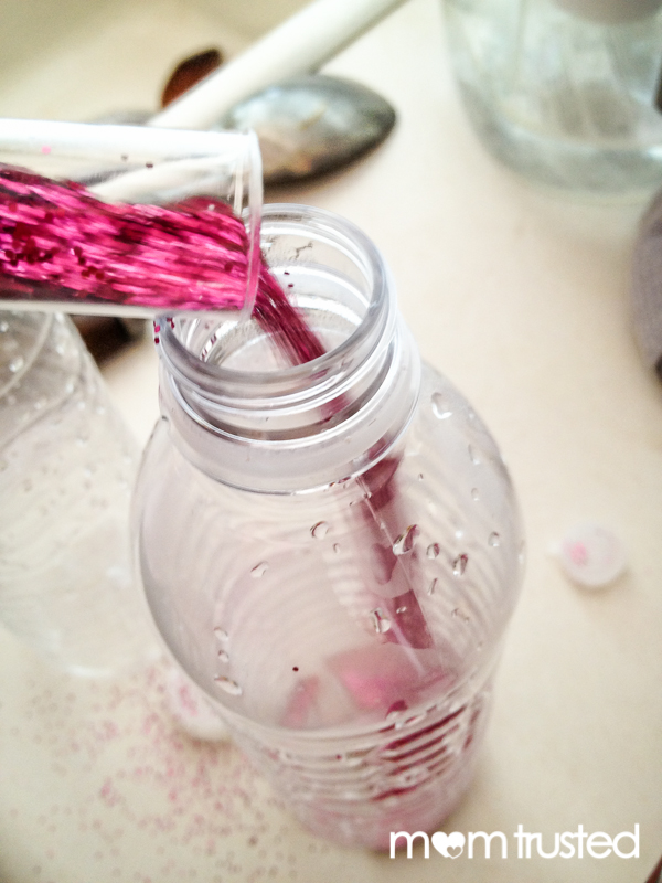 adding glitter to time-out timer bottles